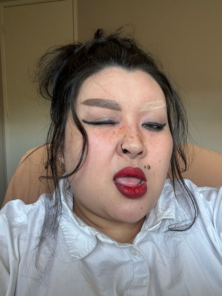 A selfie of Clore winking. 