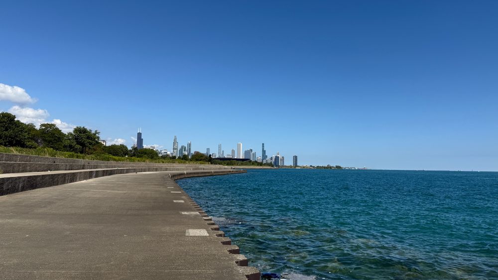 View of downtown Chicago in distance with part of Lake Michigan on the right from around 31st street beach and Beach. 