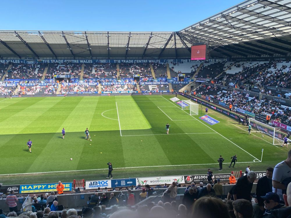 A final warm up on the field for Swansea’s players before they kick-off against Derby.