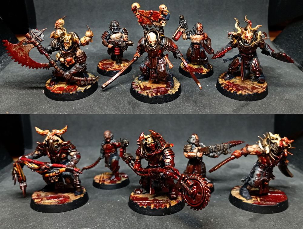 10 necromunda corpse grinder cultists in grey fatigues and brass armour. theyre covered in gore and skulls
