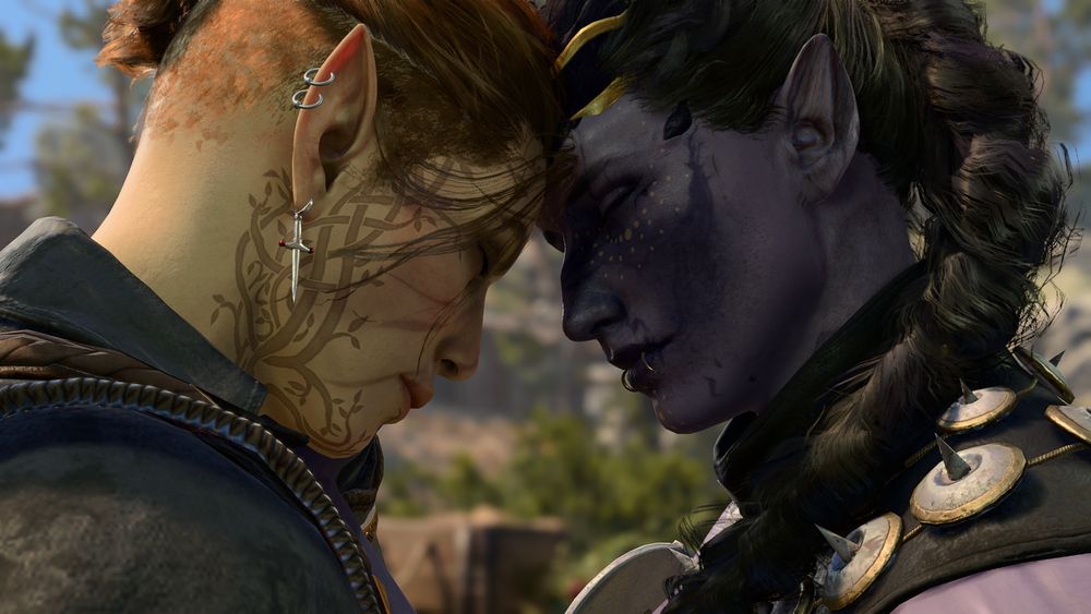 Ibryn (the half-elf) and Satyn (the tiefling) touch their foreheads together tenderly.
