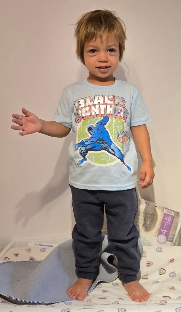 2.5 yr old child wearing a black panther tshirt - derek is not the best photographer...
