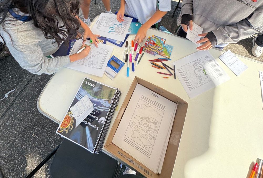 Cropped photo of children (no faces) coloring pages from the AGU Earth and Space sciences coloring book
