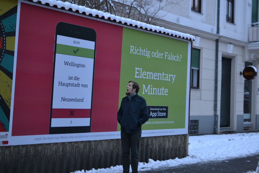 Me looking a Elementary Minute billboard