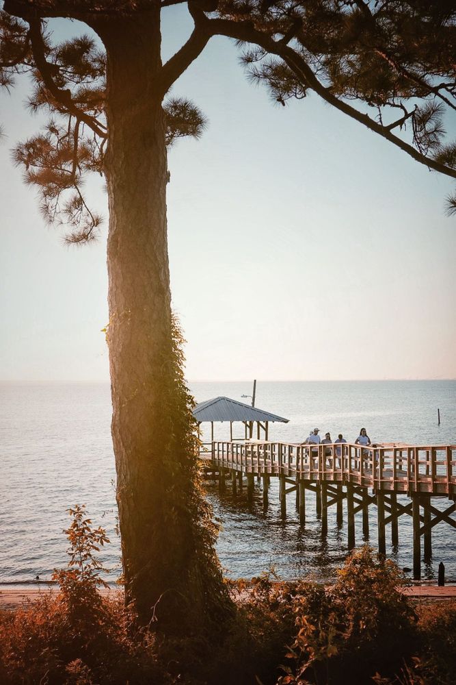 Golden hour over the Orange Street Pier in Fairhope, AL