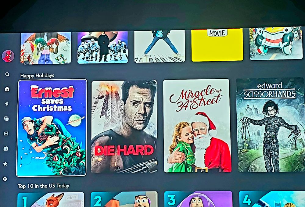 Photo of a Disney+ screen with Die Hard listed next to Ernest Saves Christmas and Miracle on 34th Street under the category "Happy Holidays"