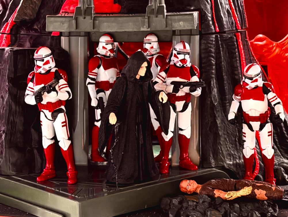 Hasbro Star Wars 3.75” figures recreate the scene from Revenge of the Sith where Emperor Palapatine and his shock troopers find what’s left of his apprentice Darth Vader charred like a burnt marshmallow  