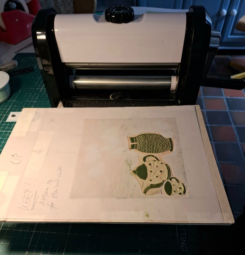 Using a "handbag press" for smaller prints.