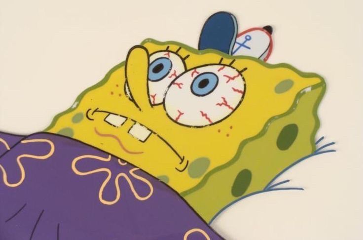 Spongebob lying awake with blood shot eyes 