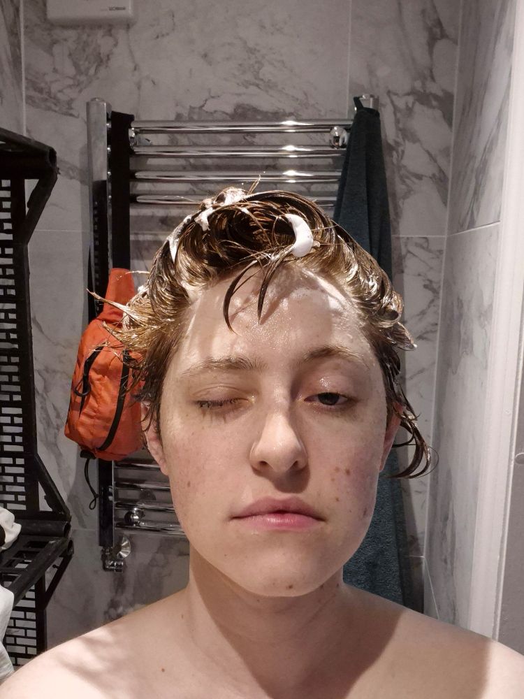 Izzie, with one eye shut (shampoo got in it) and foamed up hair.
