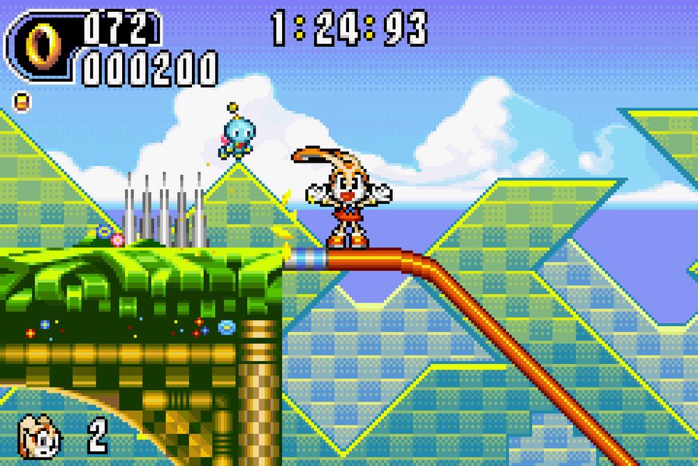 Cream happily waving as she's grinding on a rail.