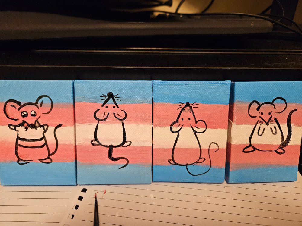 Four tiny canvases of trans mice. Line drawn mice painted over a trans pride flag background.