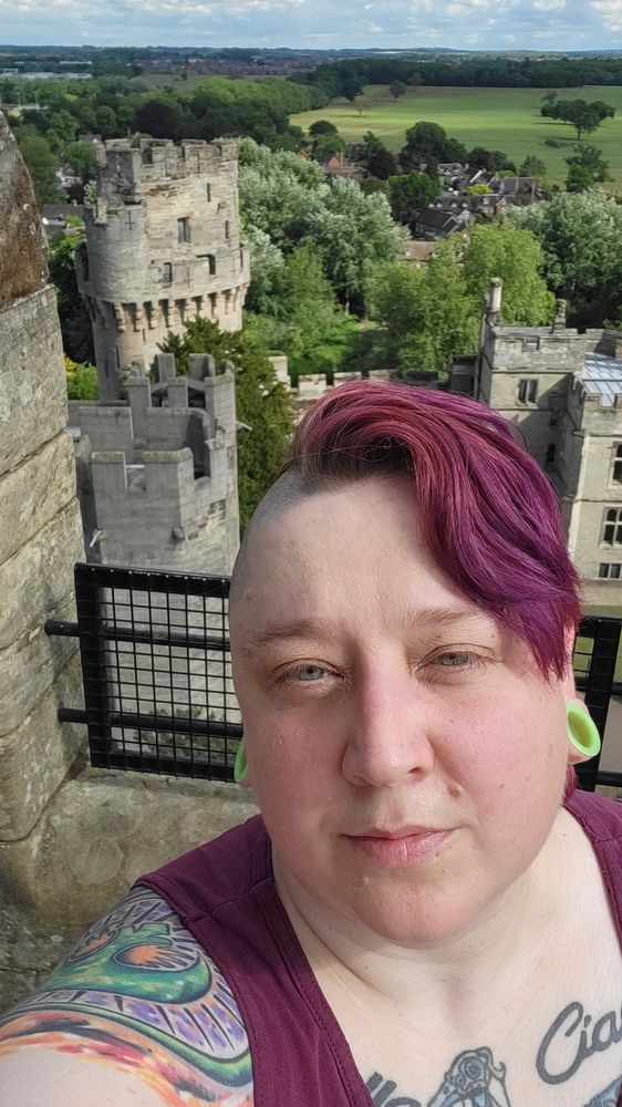 A queer on top of a castle. 