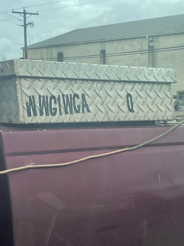 A truck with WWG1WGA stenciled on it