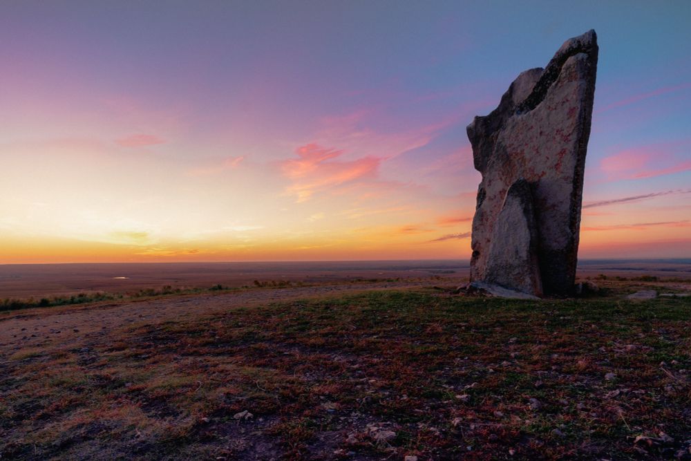 A photo of the morning sun rise over the flint hills at Teter Rock near Eureka, Kansas. 