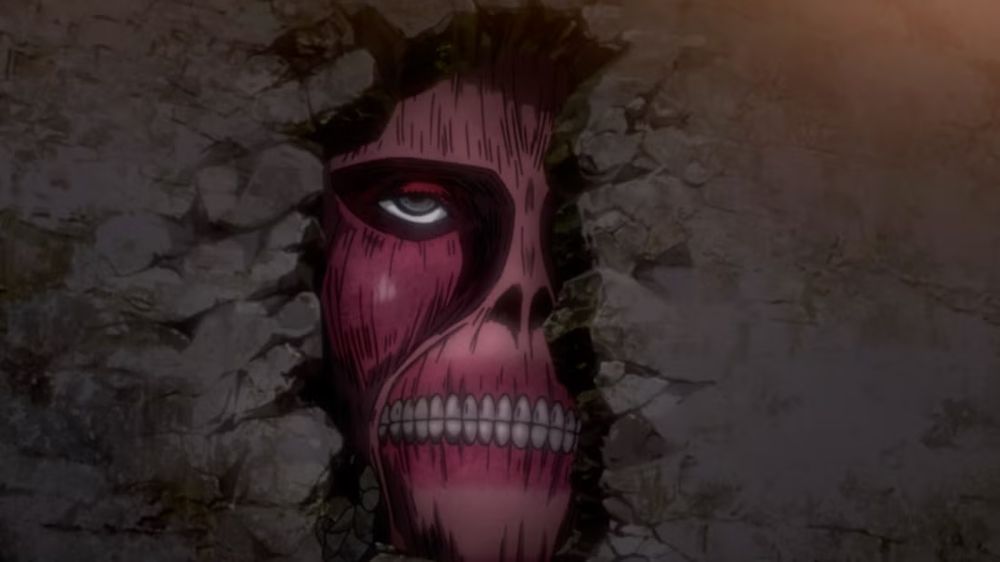 Face de titan dans le mur de Shiganshina