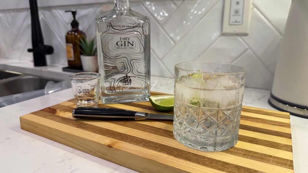 Gin a tonic ingredients on a cutting board. Yum. 