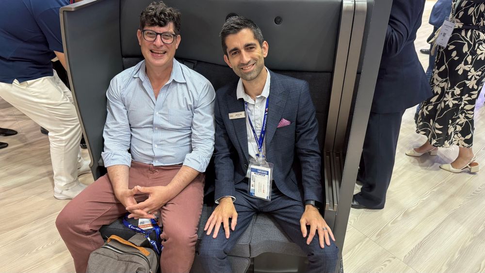Seth Miller and Jason Rosewell testing out ANA’s business class seat demo at the Paris Air Show. 