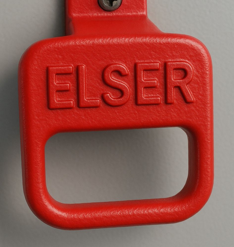 Ein roter Notbremsgriff mit der Aufschrift ELSER. 