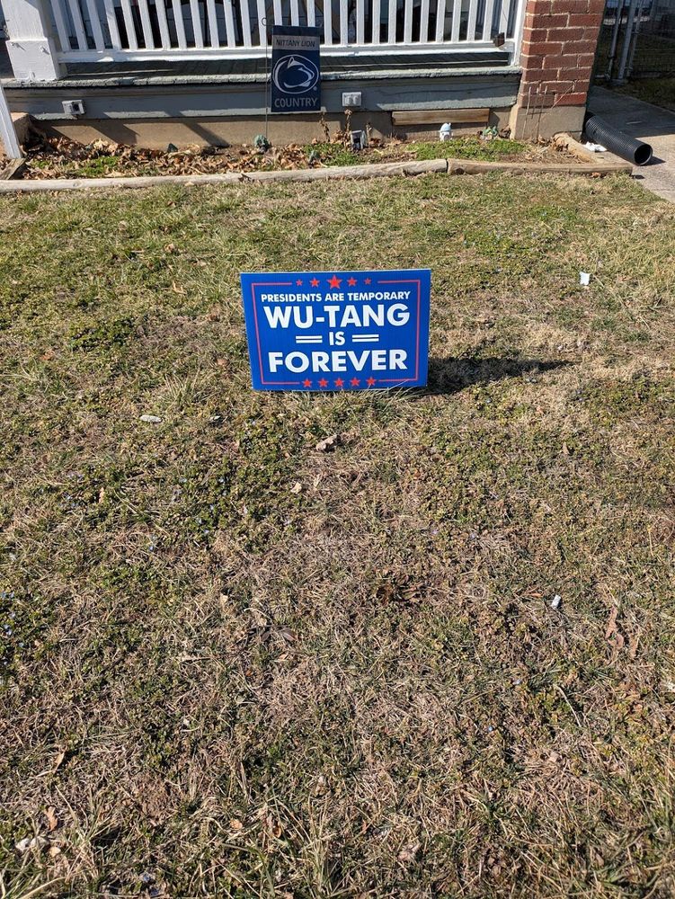 A sign that says, "presidents are temporary, Wu-Tang is forever".