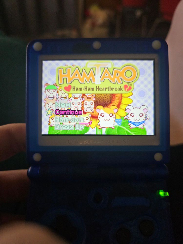 Hamtaro: Ham-Ham Heartbreak for the GBA, displayed on a GBA IPS 3.0 M2 screen (courtesy of FunnyPlaying), in a Retro Game Repair Shop shell with White rubber stoppers.