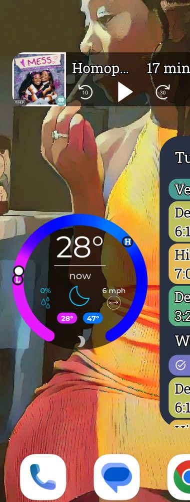 A screenshot of a phone screen that shows the temperature in Atlanta in the blue/purple at 28 degrees