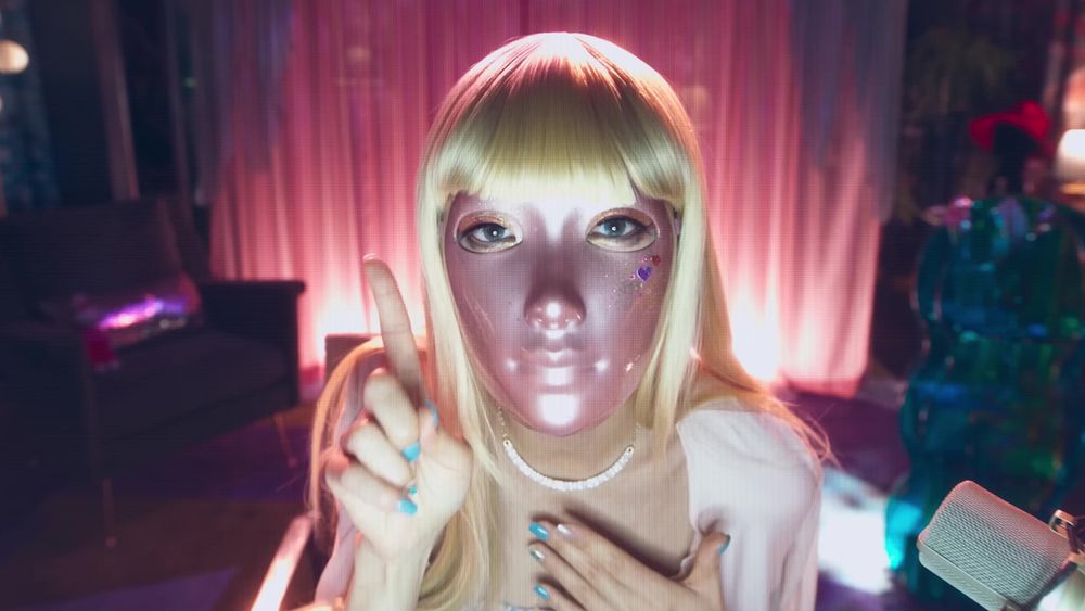 Photo of girl on video wearing a face mask