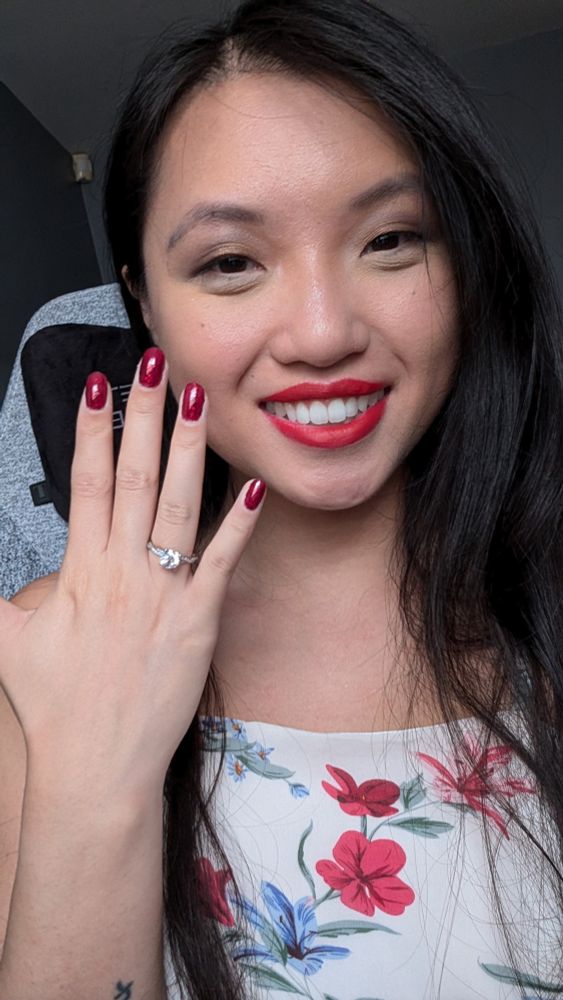 Me showing off my engagement ring 