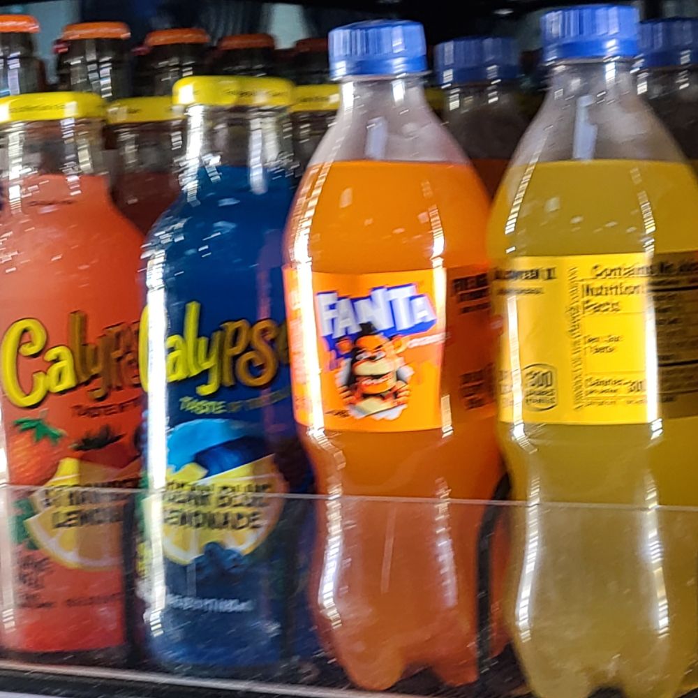 A row of soda bottles standing in a 7-Eleven freezer. One of said sodas is an orange Fanta, featuring Freddy Fazbear from hit indie horror game Five Nights at Freddy's on the lable.