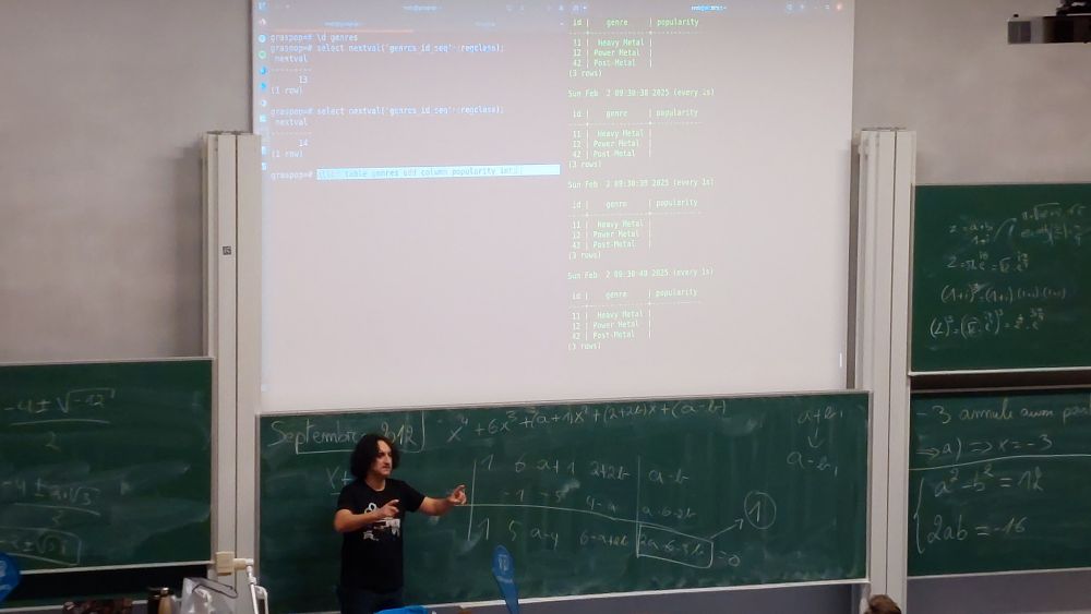 Boriss Mejías on stage at FOSDEM 