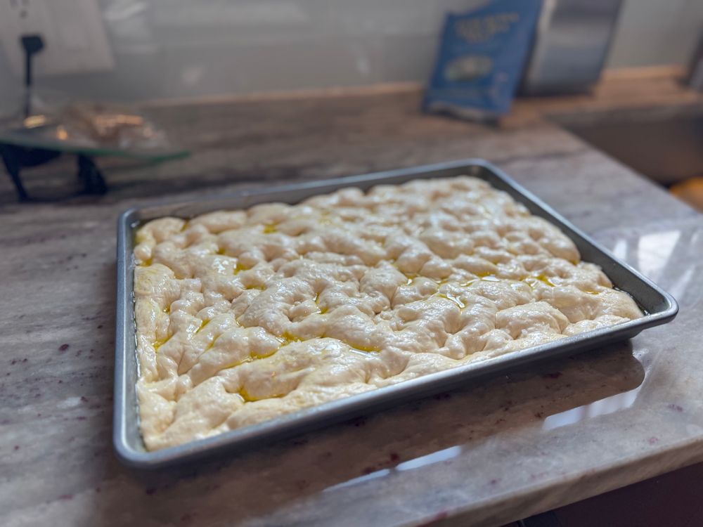 Focaccia dough in pan (unbaked)