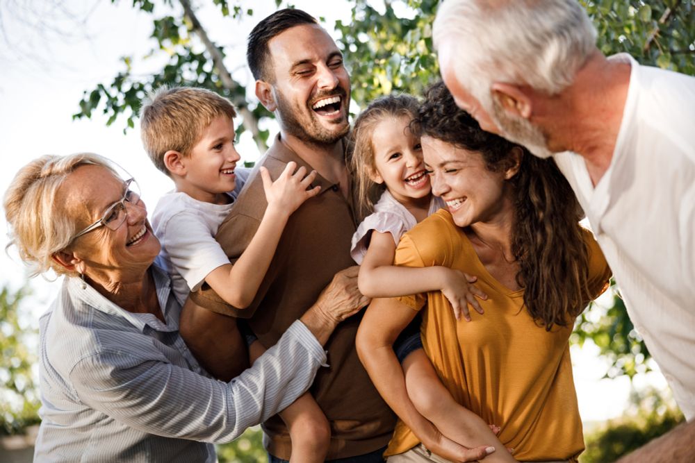 3 generations of a family, laughing together