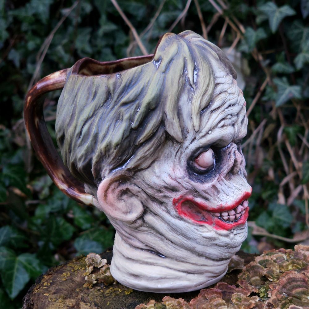 Shock monster inspired mug.  Porcelain ceramic glazed with joker makeup