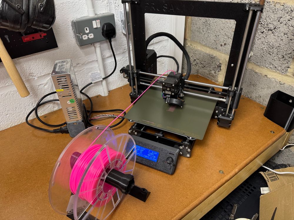 Prusa Mk3S printing neon pink PLA filament. 