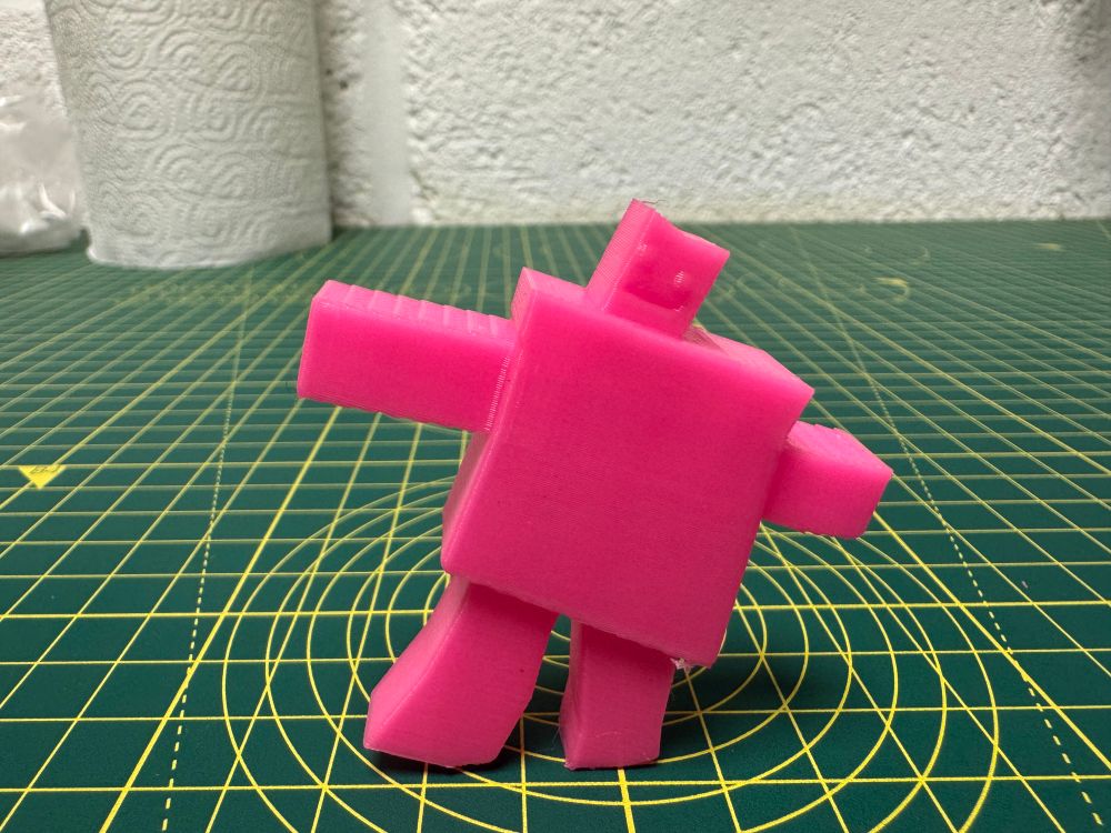 3D printed robot designed by my daughter. Printed in bright pink PLA