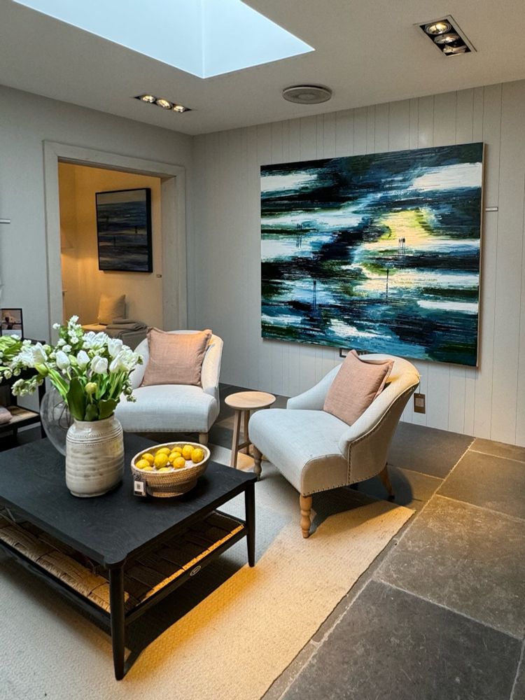 Artist Jo Holdsworth’s paintings on display in her Solo exhibition at Neptune Wimbledon in July 2024.
