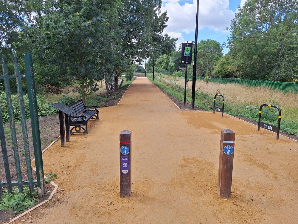 New River cycle way has benches, cycle parking stands and information boards. Also bollards to keep cars off the path.