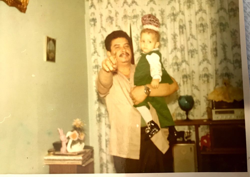 My dad holding me as a baby