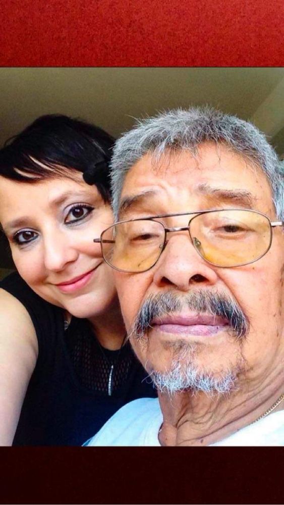 My dad and me . My dad had glasses and a goatee . 