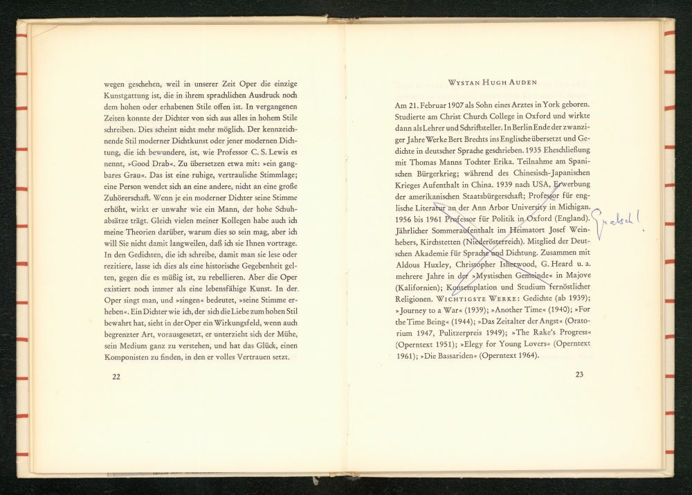 The image shows an open book with two pages visible. The left page contains a block of German text, while the right page features a biographical section about Wystan Hugh Auden, written in German. The text on the left page discusses the art of opera and its role in modern literature, mentioning the works of C. S. Lewis. The right page provides a brief biography of Auden, including his birthdate, education, and notable works. The text is printed on cream-colored paper with red lines along the edges, typical of a book's binding. The page numbers are visible at the bottom, with "22" on the left and "23" on the right. There is a handwritten note on the right page, reading "Quatsch"