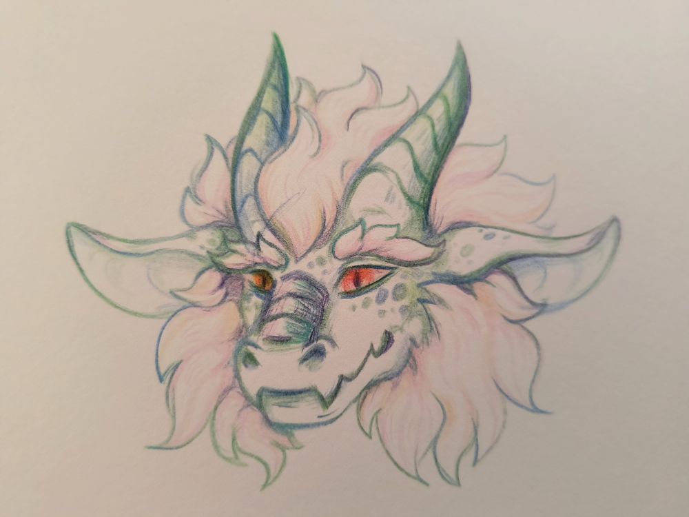 A colored pencil sketch of a dragon's head on off-white paper. The colors alternate throughout the linework because a swirled pencil was used. It has a big mane and matching cheek fluff, long ears that stick out to the sides and horns that curve up and backwards. It appears to be smiling with slightly raised, big, bushy eyebrows.
