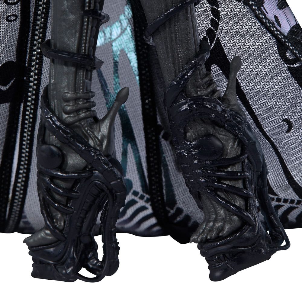 Closeup of facehugger shaped heels on the Monster High Alien doll