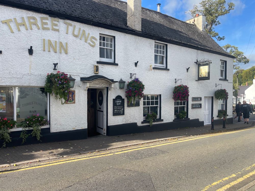 The Three Tuns Inn. A long white building with black trim. Where I’m staying tonight. 