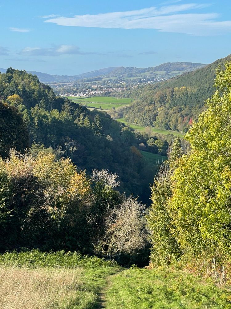 The view upriver to Monmouth in the distance. Still an 800-foot climb before reaching it. 