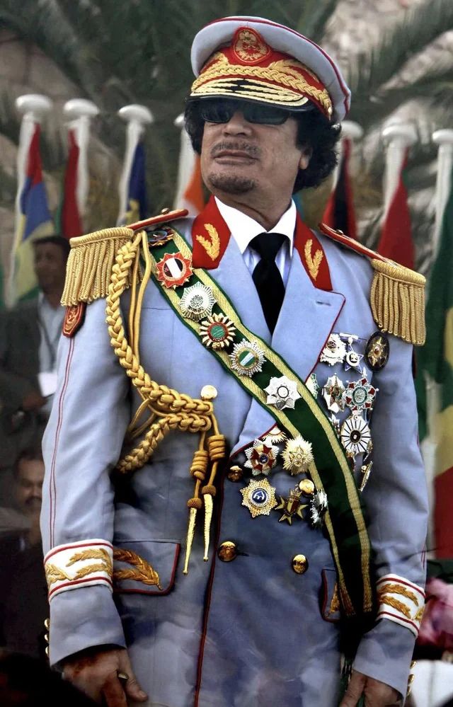 General Gaddafi in a very bling uniform
