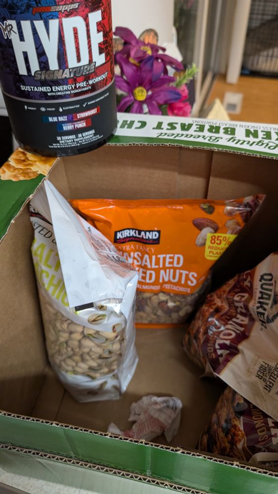 Mr. hyde Pre-Workout mix, Costco (read: large) size bag of unsalted pistachio nuts, unsalted mix nuts, and granola.