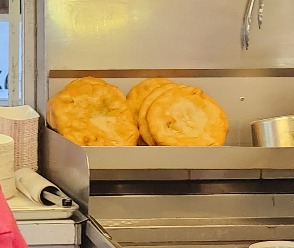 Close up of fried dough circles 