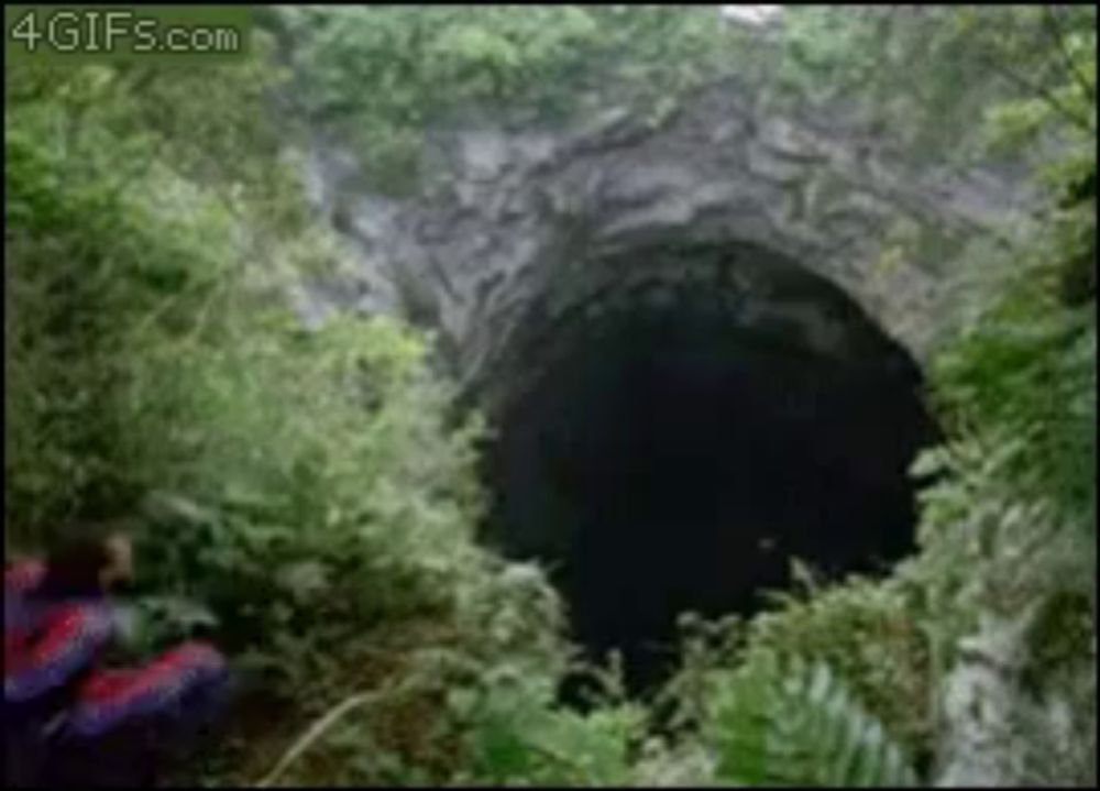 a 4gifs.com screenshot of a cave