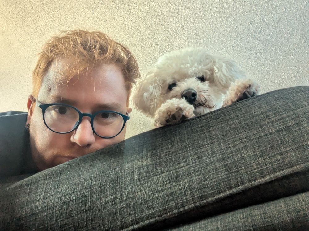 Travis and a photo of a dog that really just does look so much like a Muppet