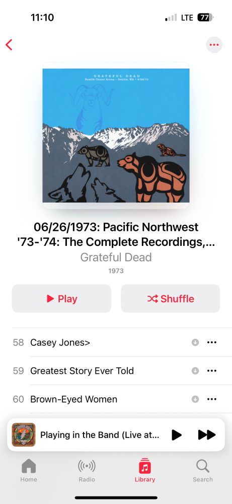 Cover of the 6/26/73 show in Seattle from the Grateful Dead’s Pacific Northwest box set. Featuring a bright blue sky, mountains, and indigenous art 